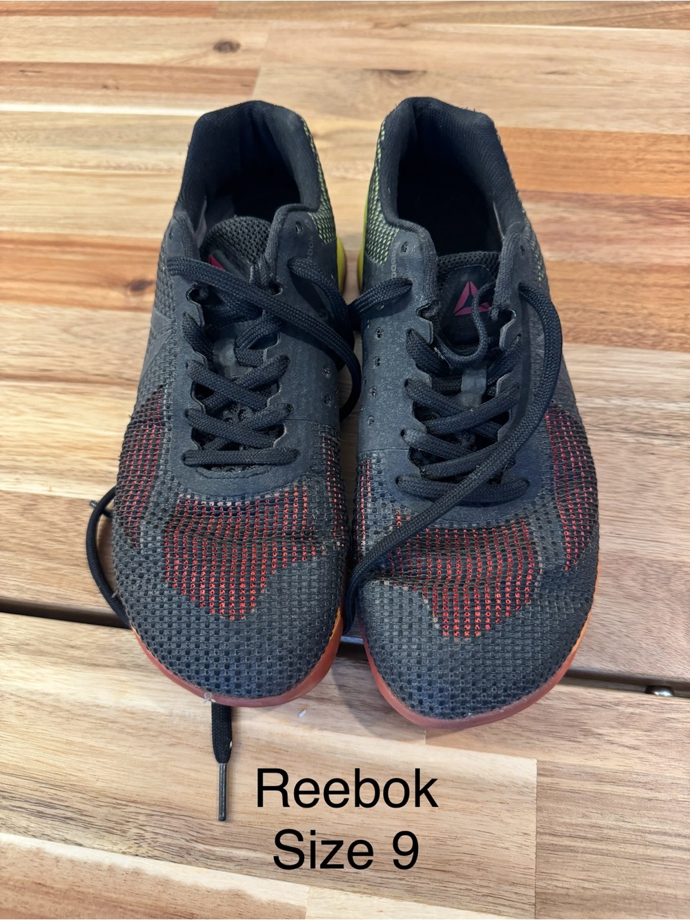 Reebok Men’s Black Athletic Shoes with Red and Green Details